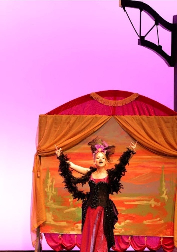 Clara performing a solo number onstage